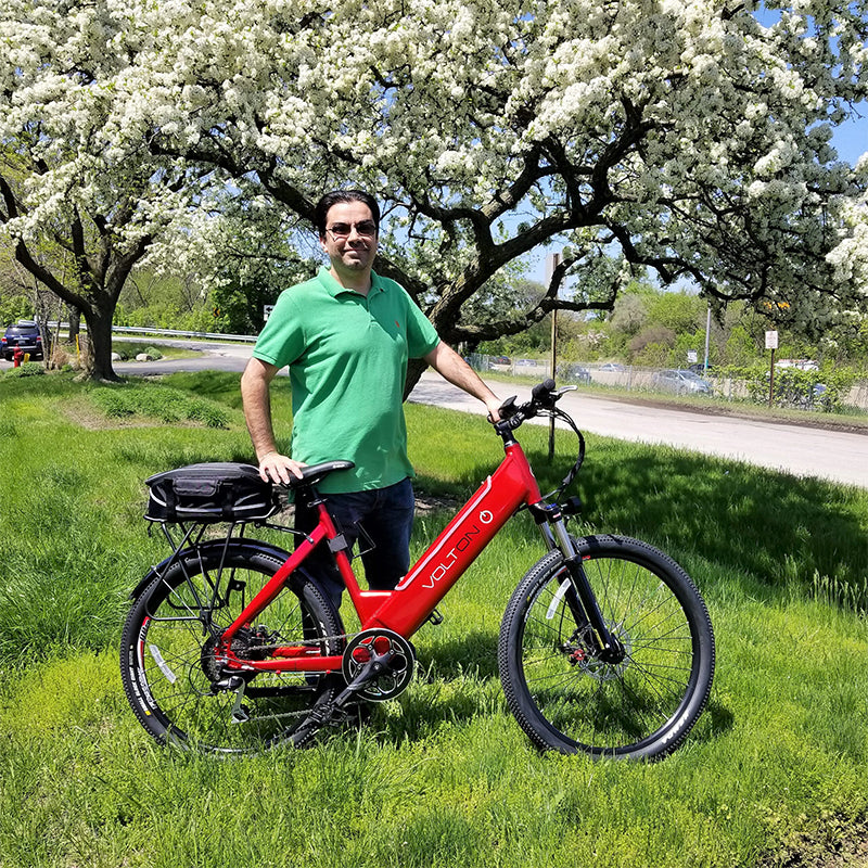 Man standing with Electric Bike
